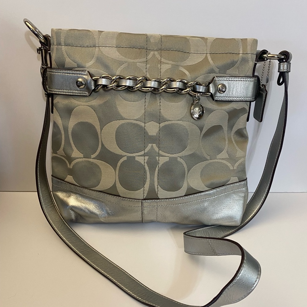 Coach gray/silver crossbody bag. Signature C with hang tag and charm